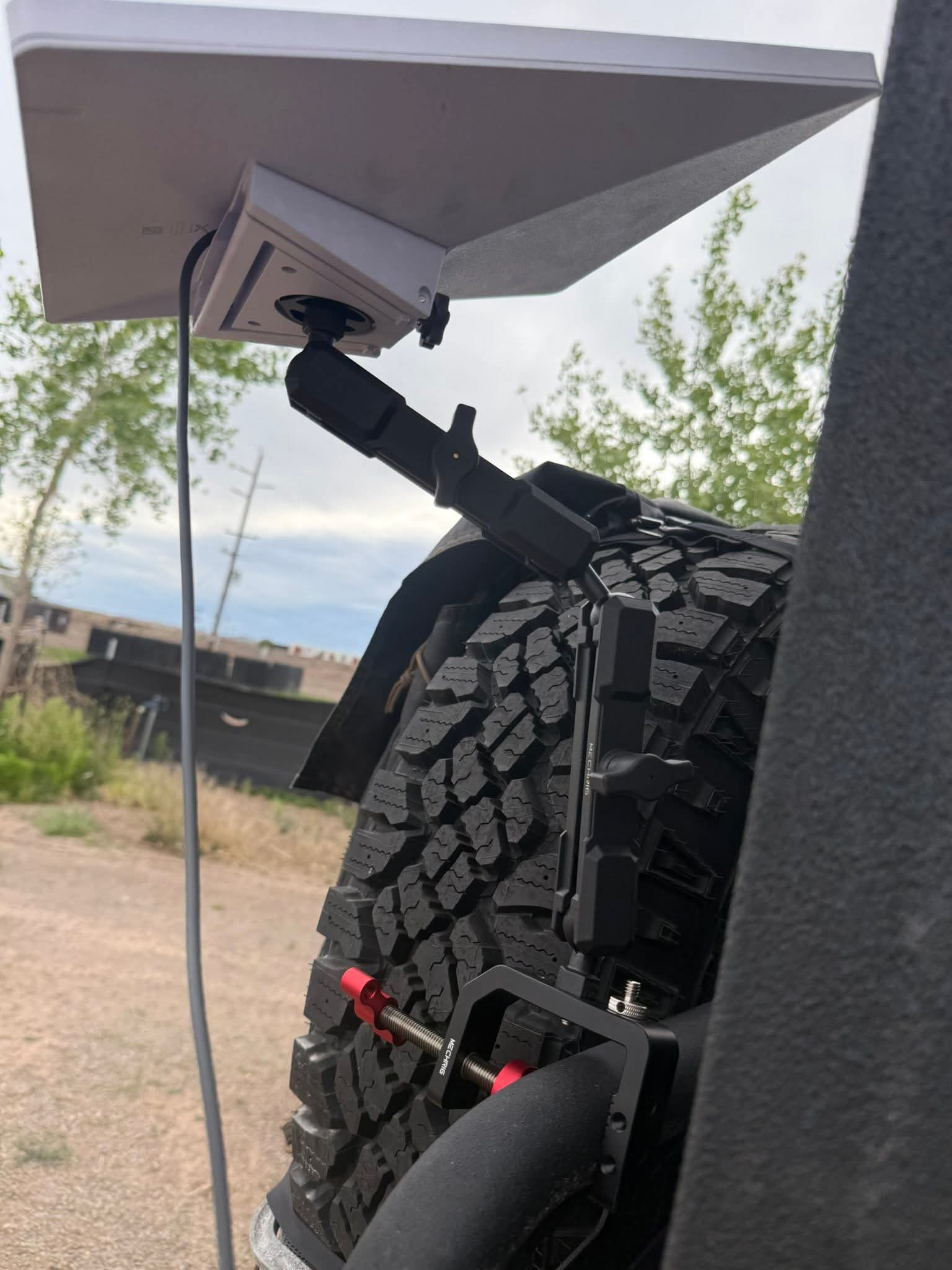 Starlink Mini mounted on a vehicle spare tire