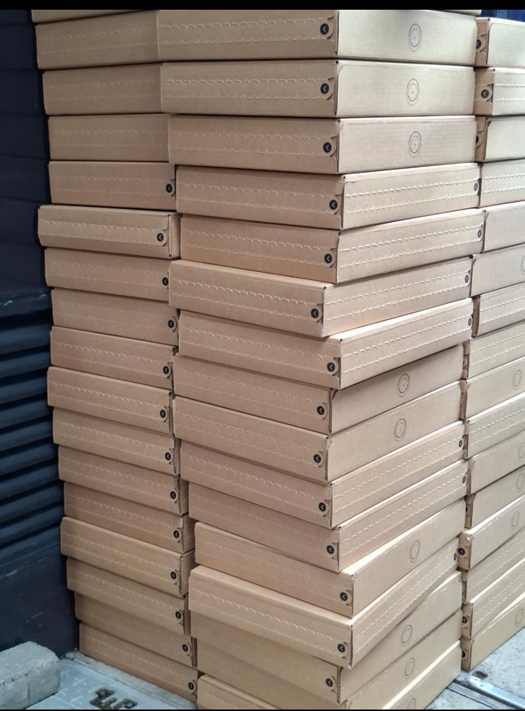 Closely stacked Starlink boxes in storage