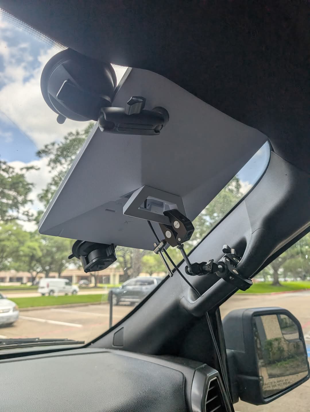 Starlink Mini mounted inside a vehicle windshield
